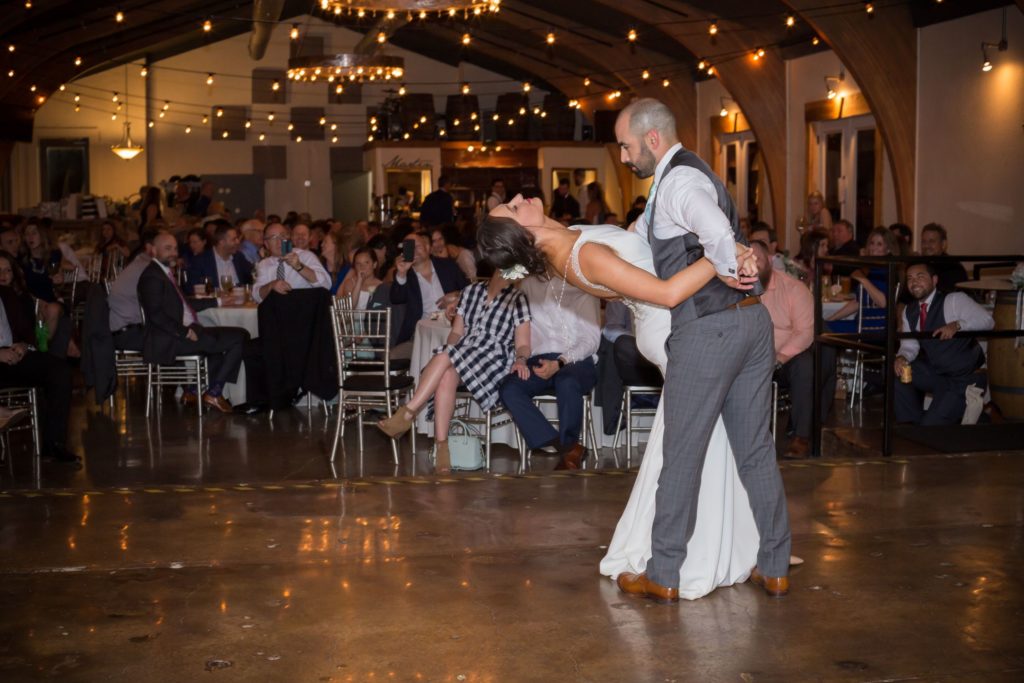 Bride and groom share first dance at The Martin Event Space after their spring wedding