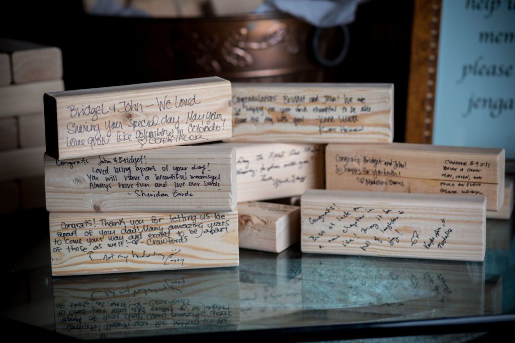 Jenga bricks for guests to write advice and congratulations to bride and groom
