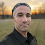 Headshot of Kylan, a wedding videographer for Complete Headshot of Kylan, videographer for Complete Weddings + Events.