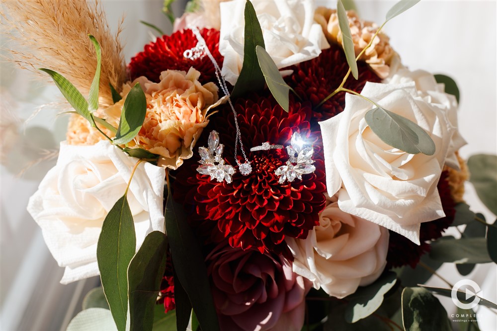 Bouquet shot with rings in Kearney Nebraska wedding ceremony