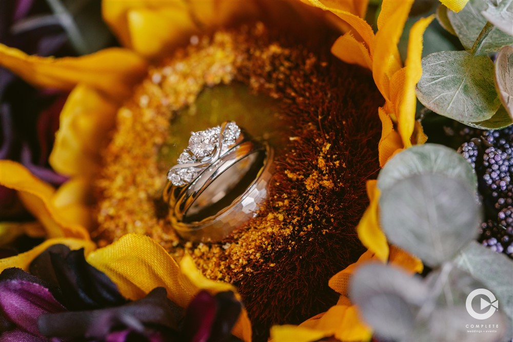 Wedding flower with wedding rings inside flowers