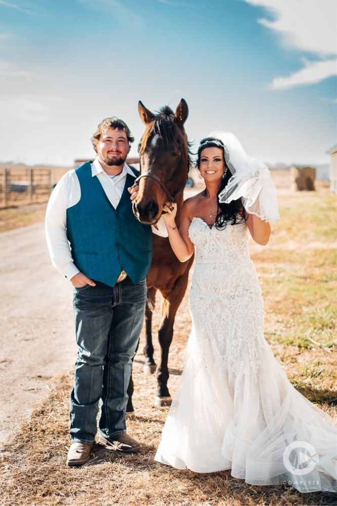 bride, groom, and horse