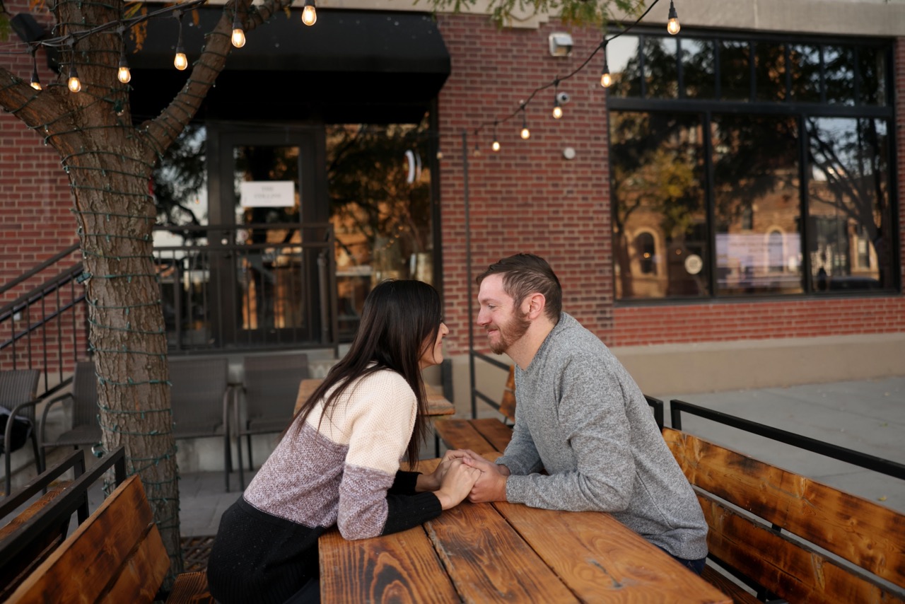 engagement photos at a restaurant