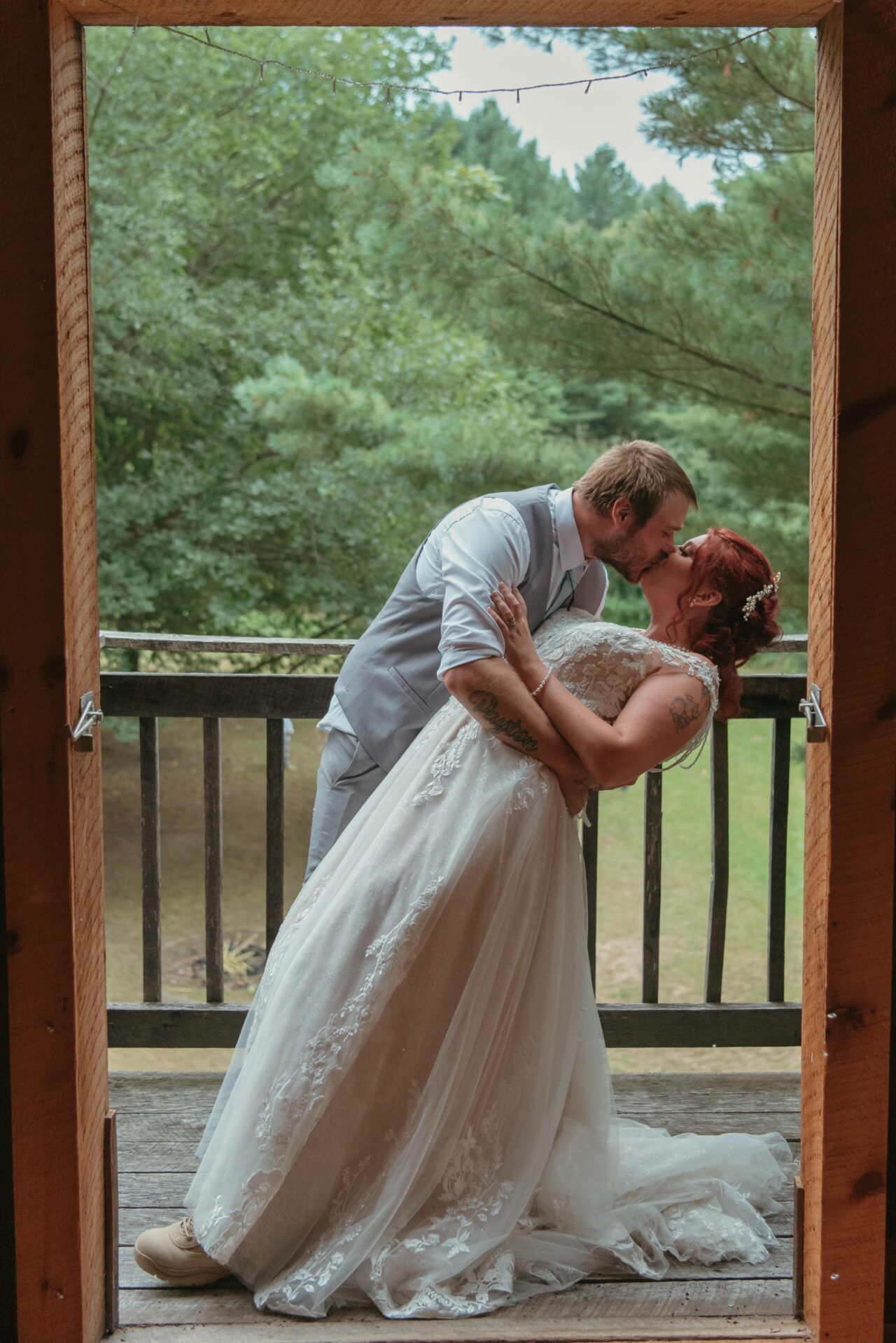 Bride & Groom Kissing outside