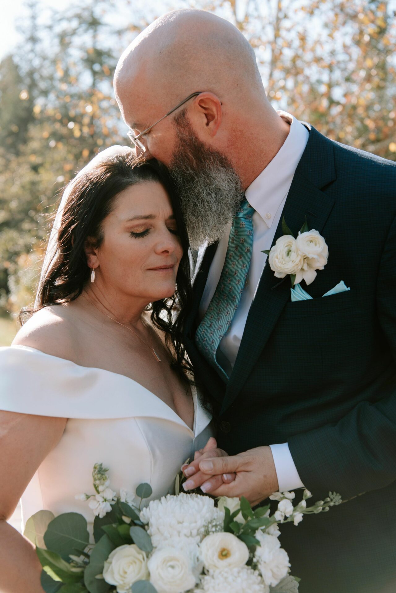 Groom Kissing Brides Head