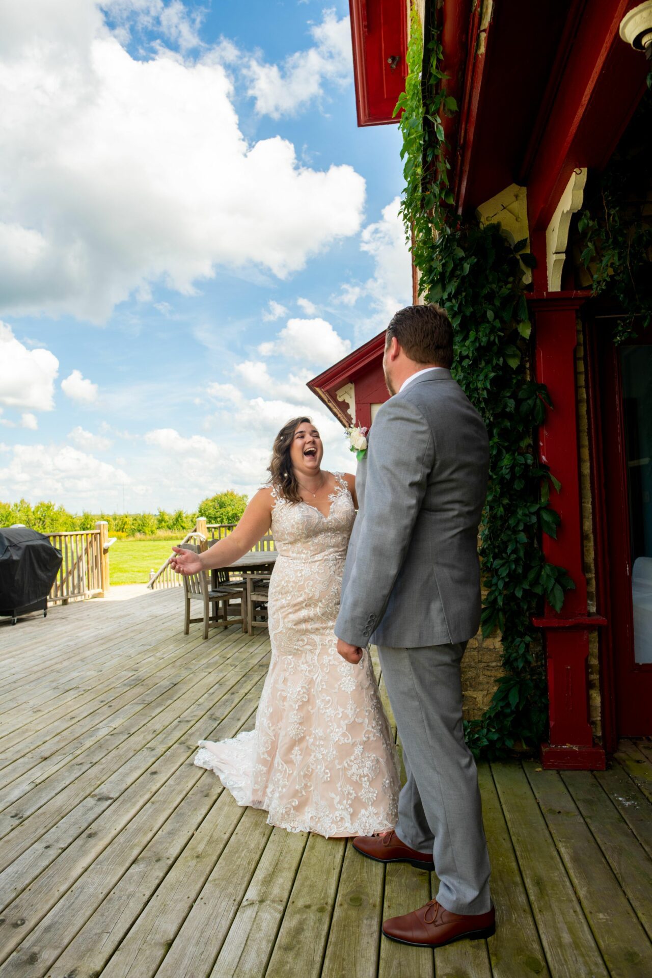 Bride ready to hug groom at their first look