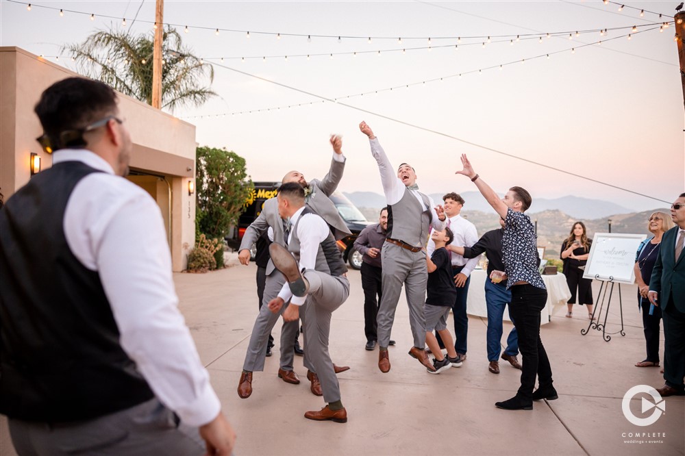 groomsmen try to catch garter Moments To Capture