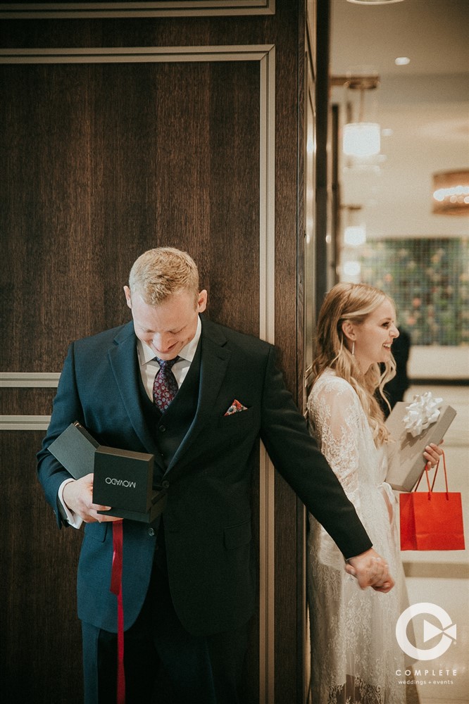 first look photos with wedding gifts