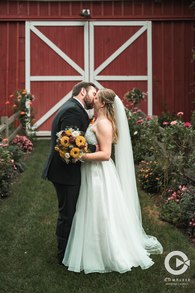 Fall wedding barn couple portrait