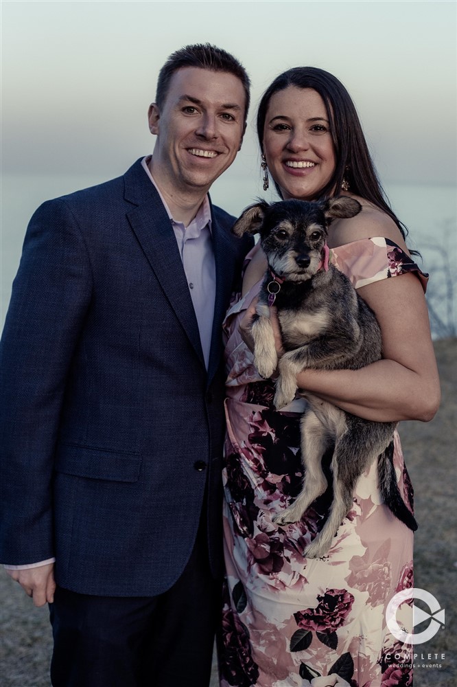 Couple with their dog during engagement shoot