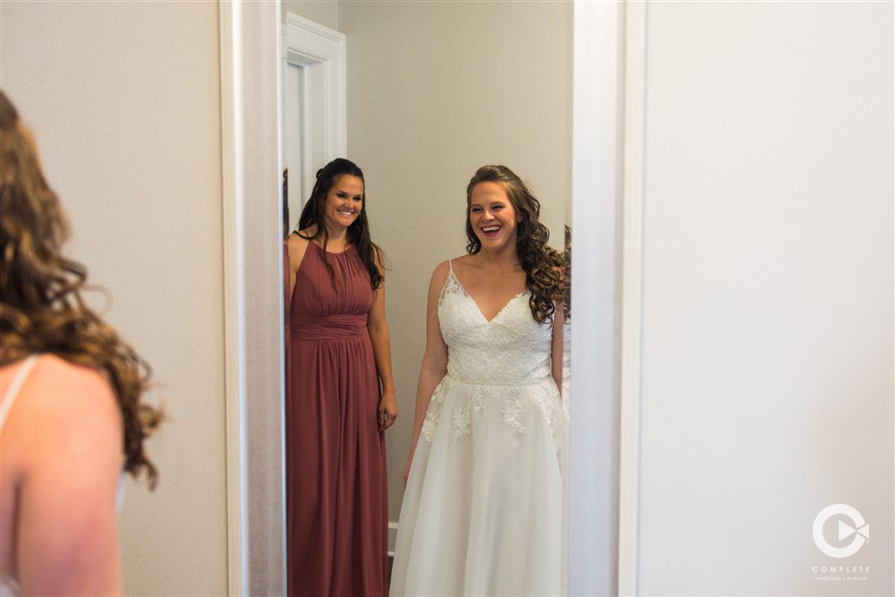 Covenant at Murray Mansion wedding bride sees herself in mirror