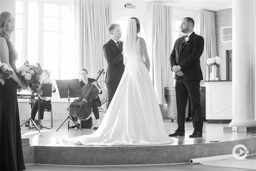 bride and groom at riviera ballroom altar