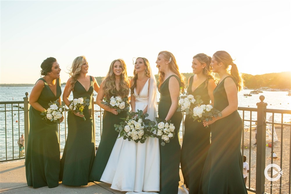 bridal party in emerald green dresses