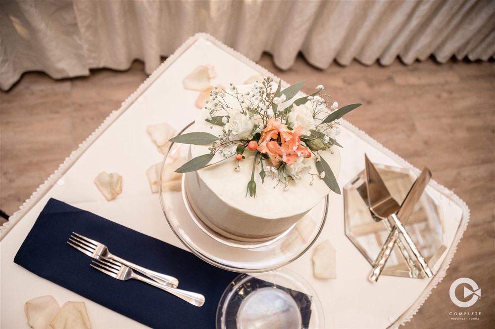 navy and coral wedding cake