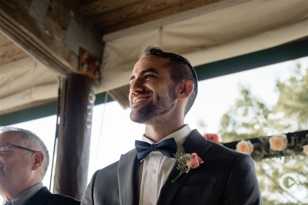 groom reaction to bride walking down the aisle