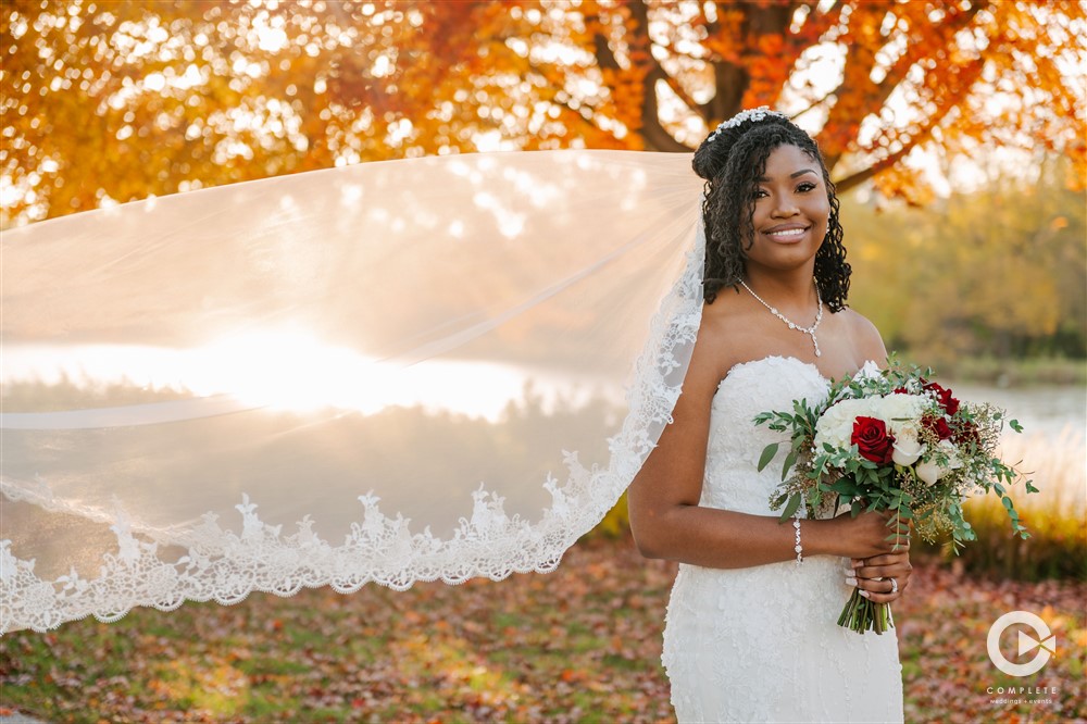 Bride Angel against fall Wisconsin backdrop