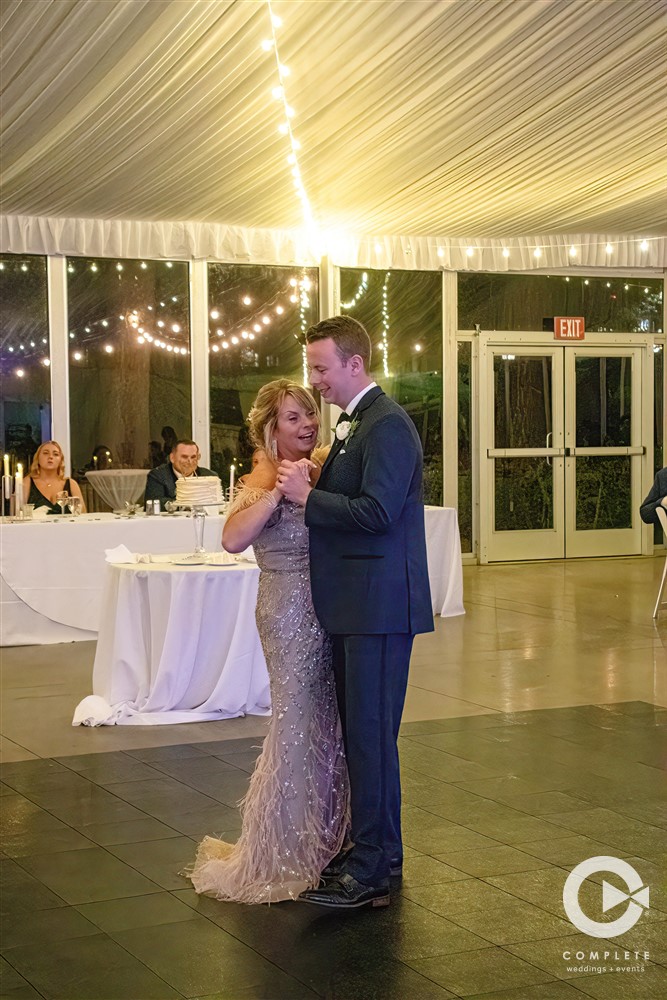 Mother and groom dance