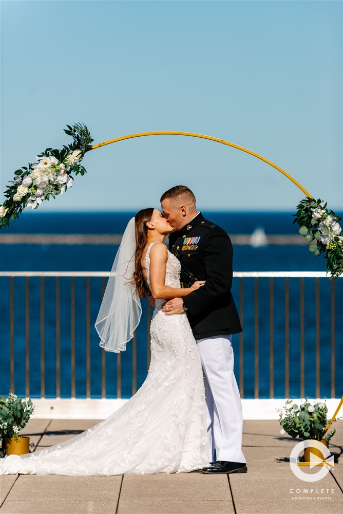 bride and groom kiss