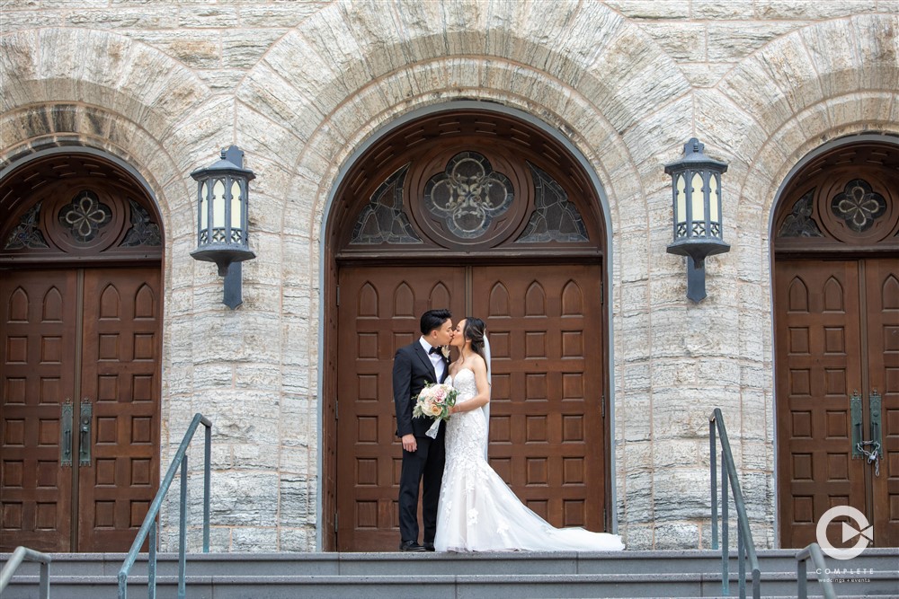 couple in front of church