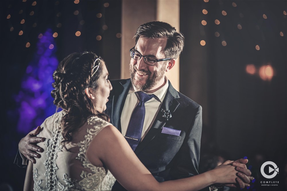 Newlyweds enjoying their first dance as husband and wife