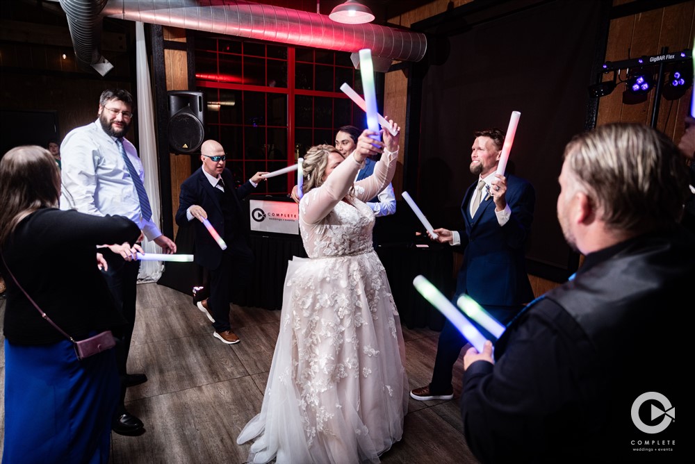 Bride on dance floor DJ From Complete Weddings + Events