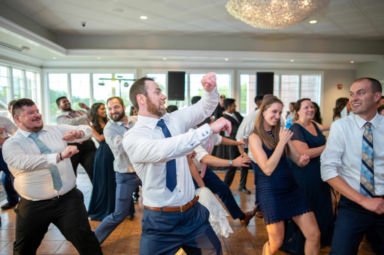 High-energy line dance during a Nashville wedding celebration