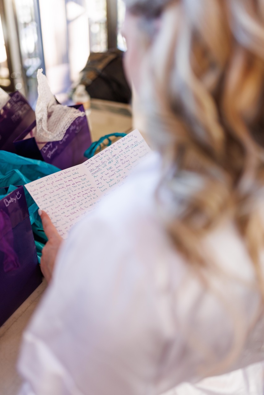 bride reading a letter from groom