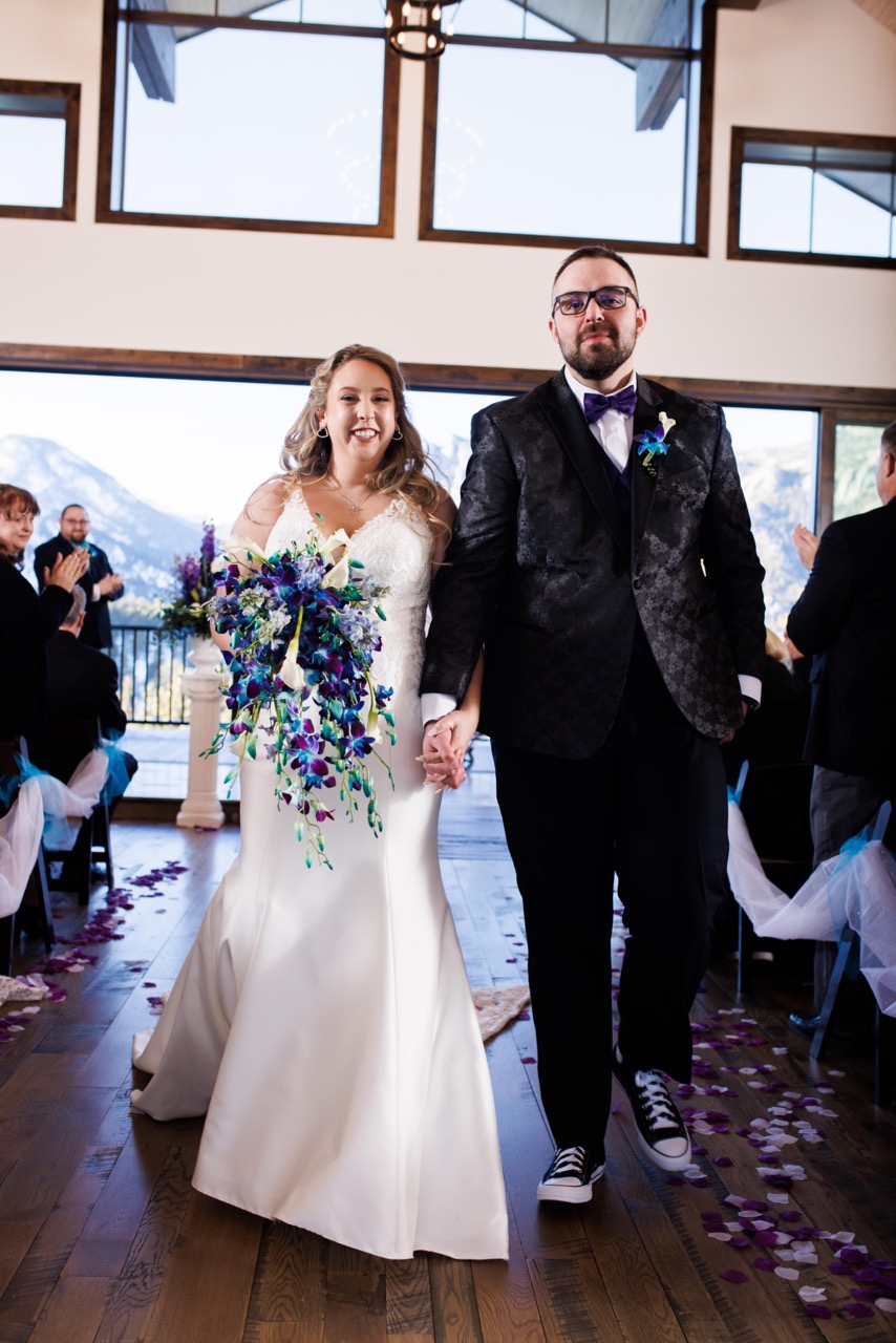bride and groom exciting the ceremony