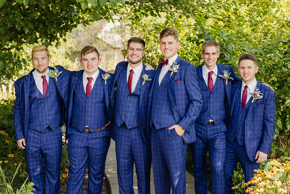 groomsmen in cobalt suits