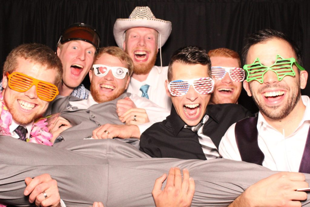 Groom with Guests in Photo Booth
