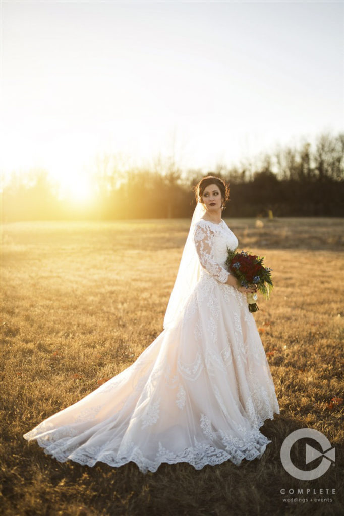 Bridal Portrait in field during golden hour | Rogers Ar