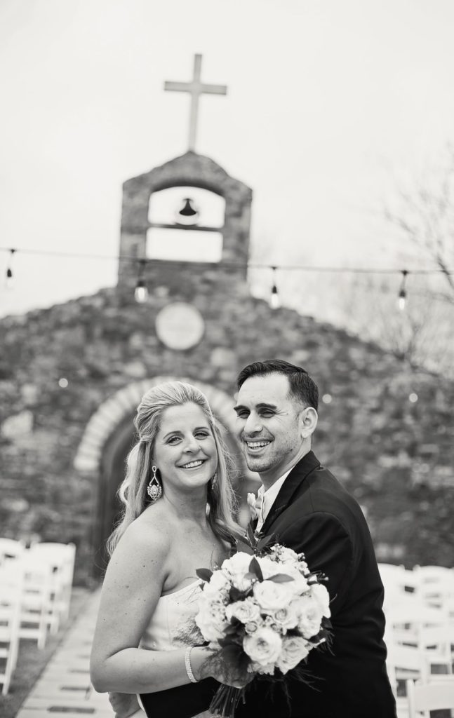 bride and groom laughing at the chapel ruins at Sassafras Springs