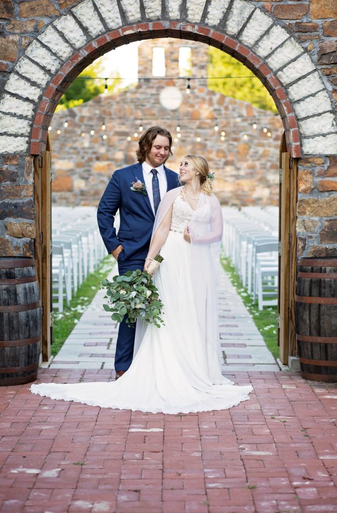 Bride and Groom looking into each others eyes at Sassafras Springs Chapel