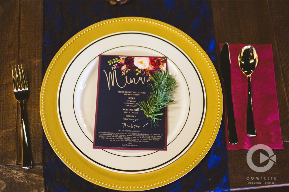 Place setting and menu for wedding in winter