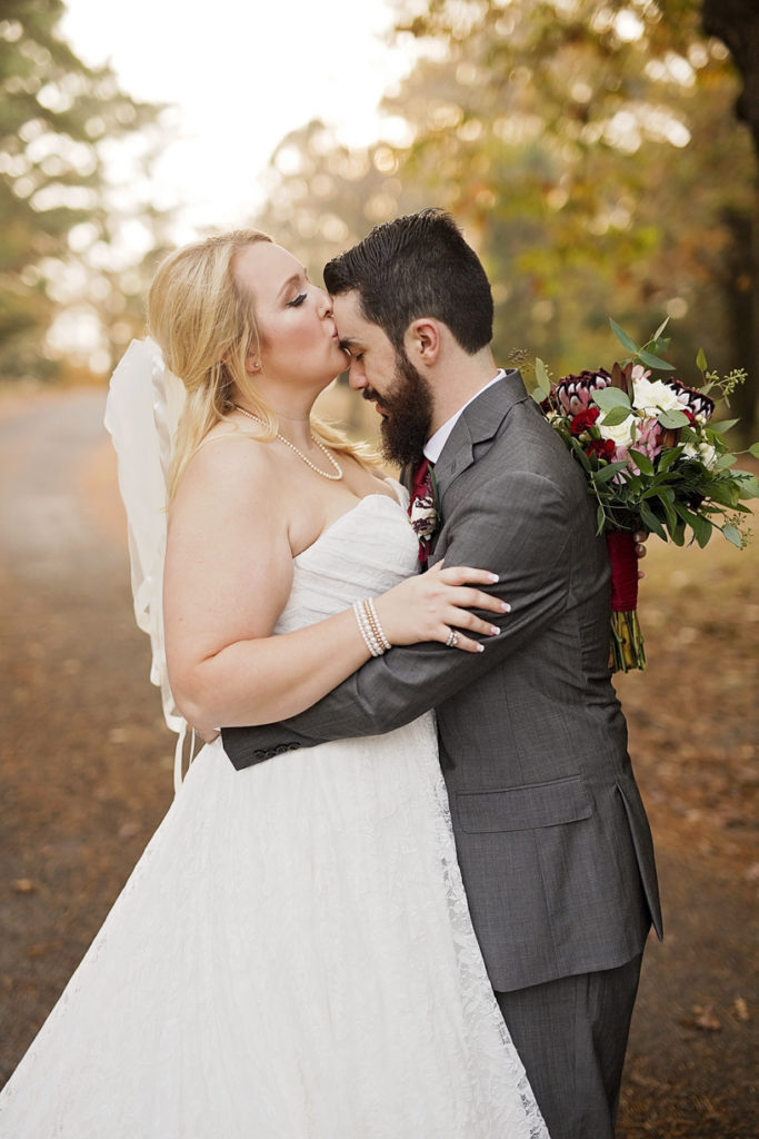 Fall Wedding | Bride kissing grooms forehead