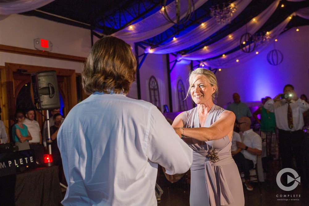 Northwest Arkansas Wedding Photography of Mother and Son dancing at wedding reception