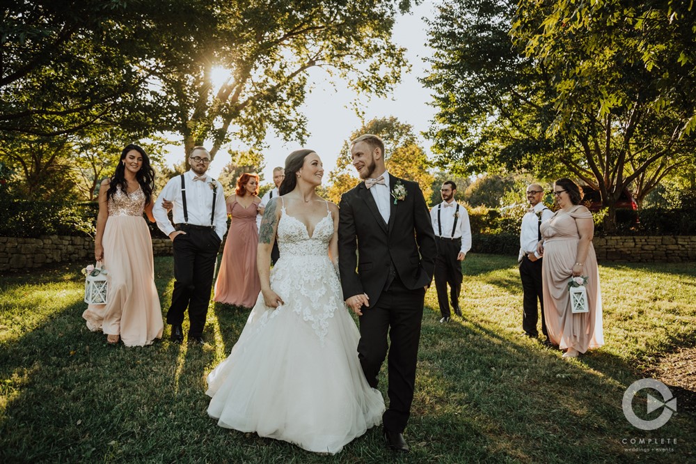 Northwest Arkansas Wedding Photography of bridal party during golden hour
