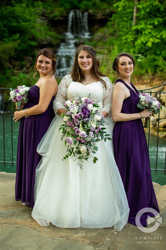 bride and bridesmaids holding bouquets dogwood canyon