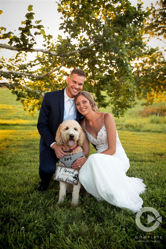 bride, groom, and goodest boy