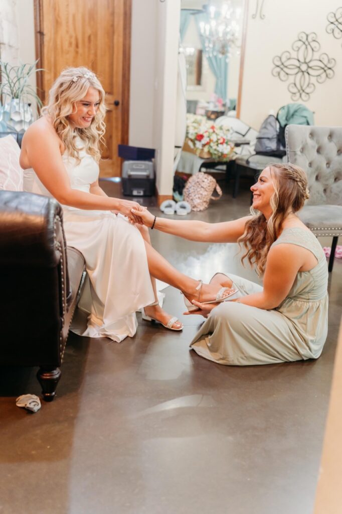 getting ready with bridesmaid