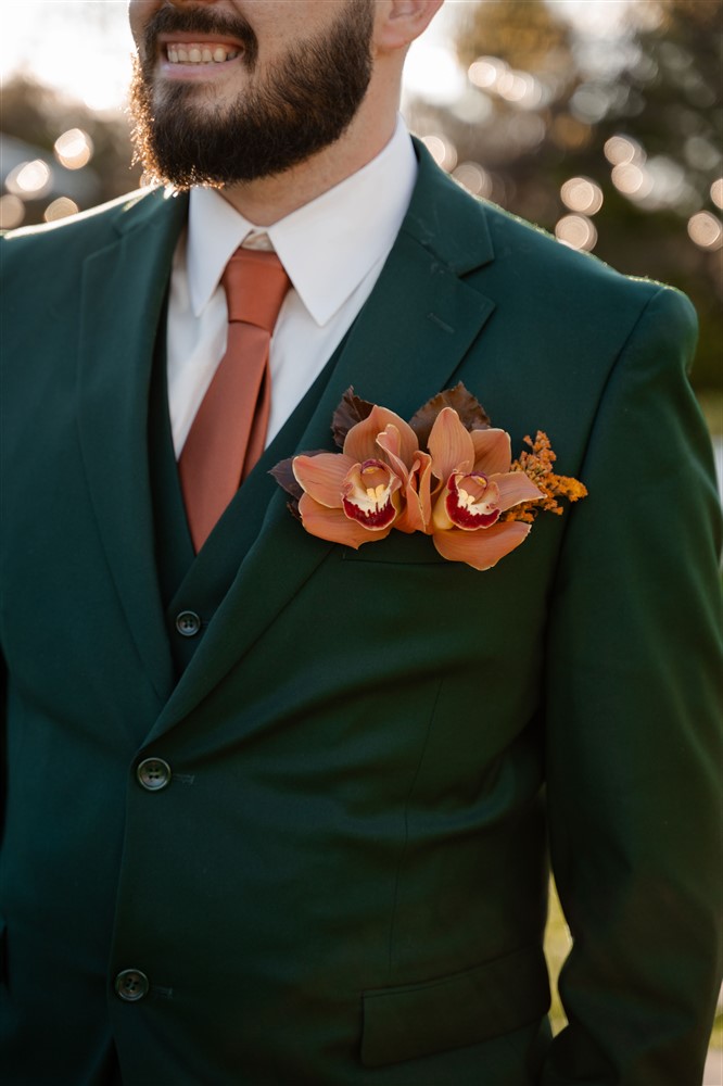 orange groom attire