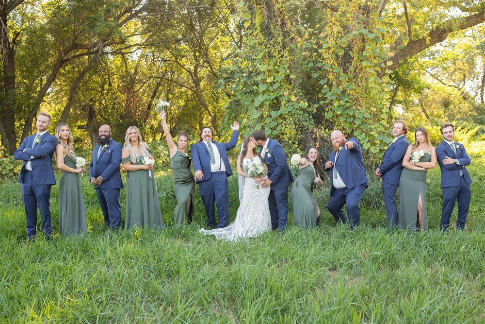 Bridal party photo at the Farmhouse venue outside of Omaha with wedding photographer Cassie Burley