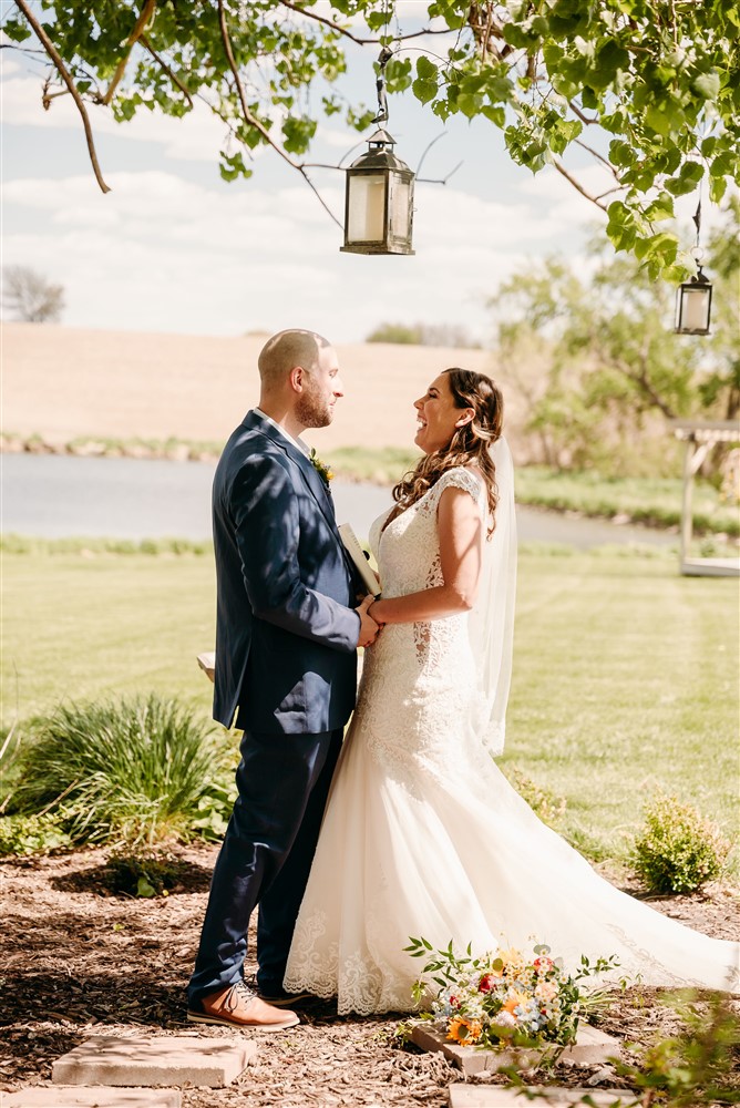 A wedding at Spark Barn a venue located right outside of Omaha, NE during the first look with wedding photographer Erin Mitchell