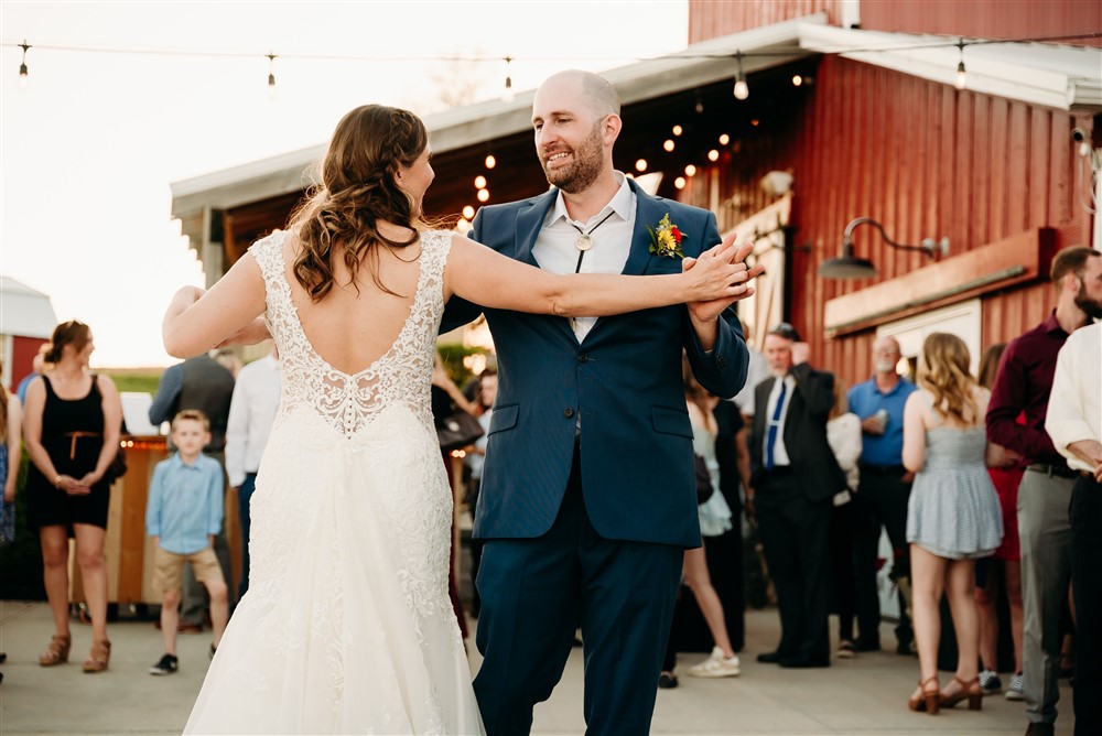 A wedding at Spark Barn a venue located right outside of Omaha, NE during the first dance with wedding photographer Erin Mitchell