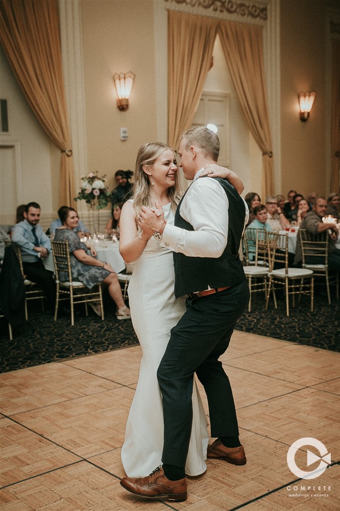 bride and groom dancing in Paxton ballroom