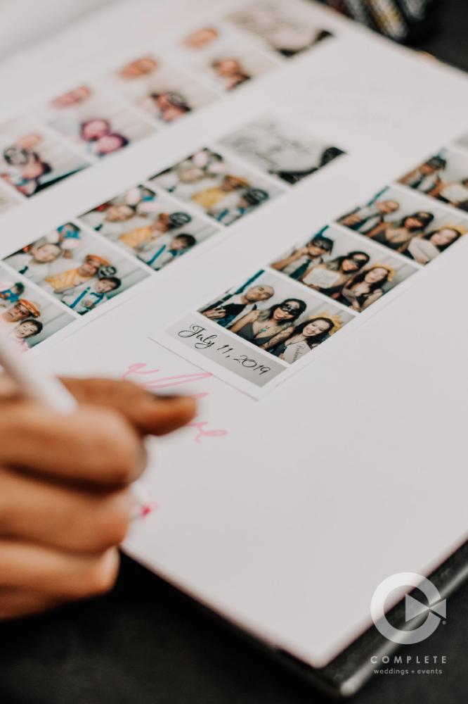 sign a photo book with photo booth strips