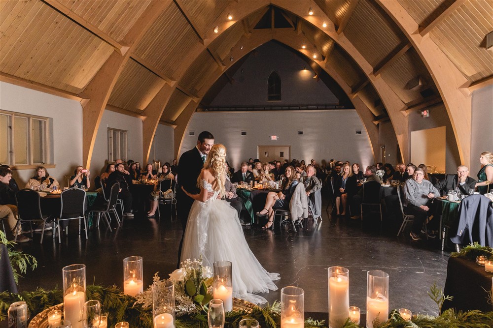 Carmen Mainelli taking a photo of the first dance at The Pella at Blackstone a venue in Omaha