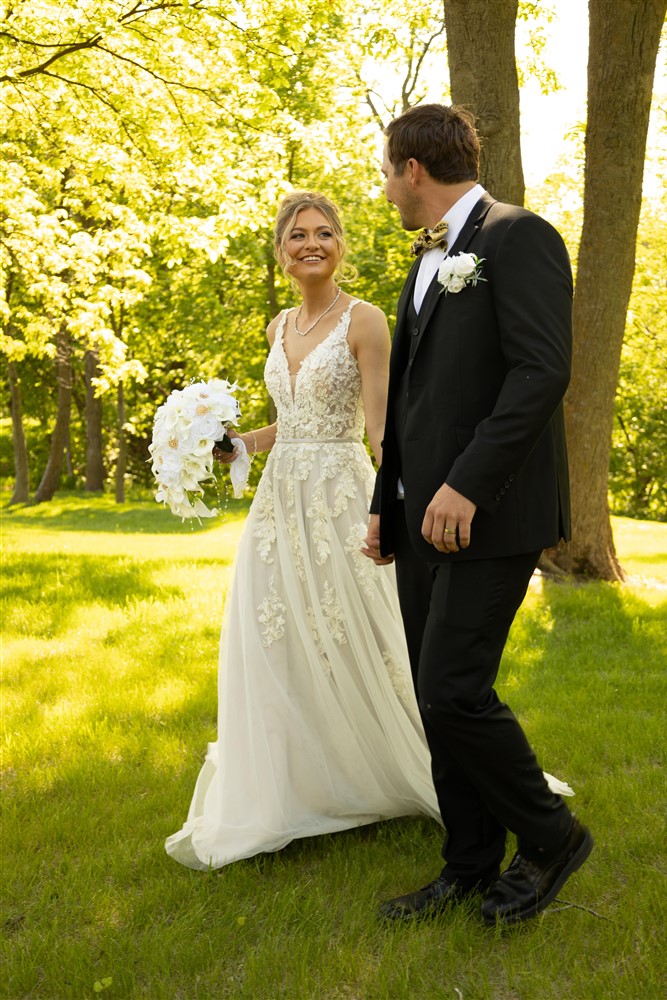 Bride and groom at Castle Unicorn a venue right outside of Omaha with wedding photographer Claire Katan