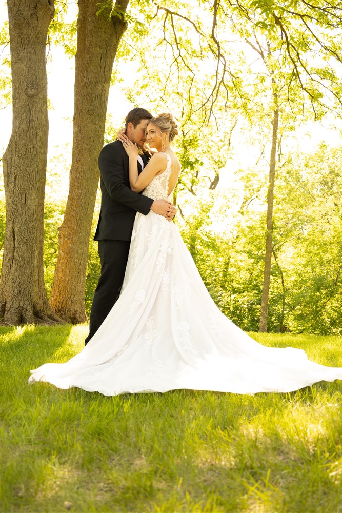 Bride and groom at Castle Unicorn a venue right outside of Omaha with wedding photographer Claire Katan