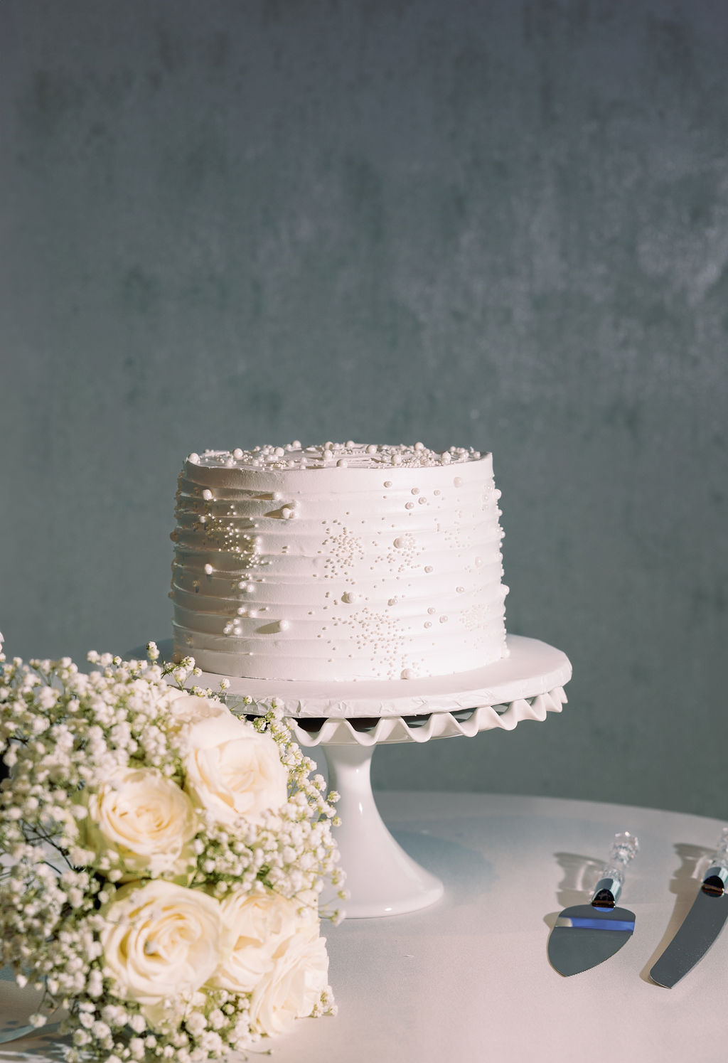 Wedding cake simple photo in Ashland captured by Vanessa with Complete Weddings + Events Omaha wedding photographer